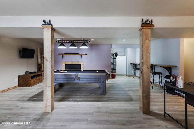 rec room with pool table and hardwood / wood-style flooring