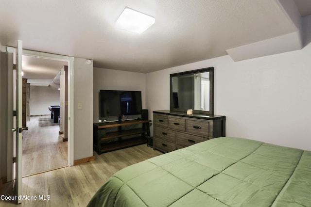 bedroom featuring light hardwood / wood-style floors