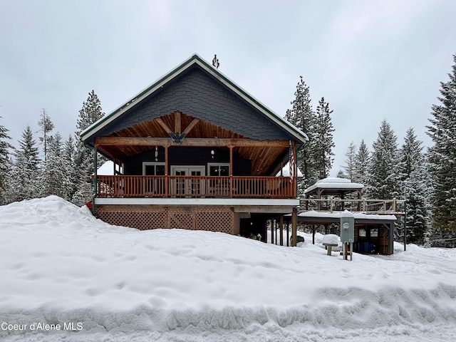 view of snow covered house