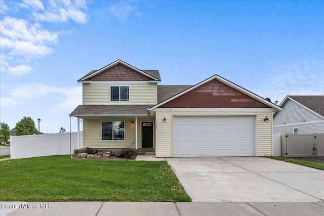 13043 N Zodiac Loop, Rathdrum, ID 83858 - view of front of home featuring an attached garage, driveway, a shingled roof, and a porch