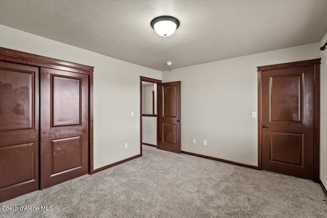13043 N Zodiac Loop, Rathdrum, ID 83858 - unfurnished bedroom with light colored carpet and baseboards