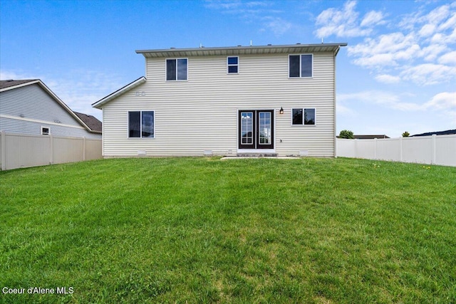 13043 N Zodiac Loop, Rathdrum, ID 83858 - rear view of house featuring french doors