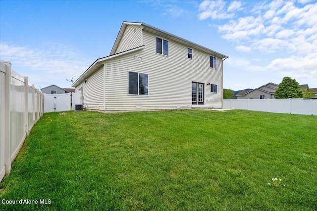 13043 N Zodiac Loop, Rathdrum, ID 83858 - rear view of property with a gate and central AC unit