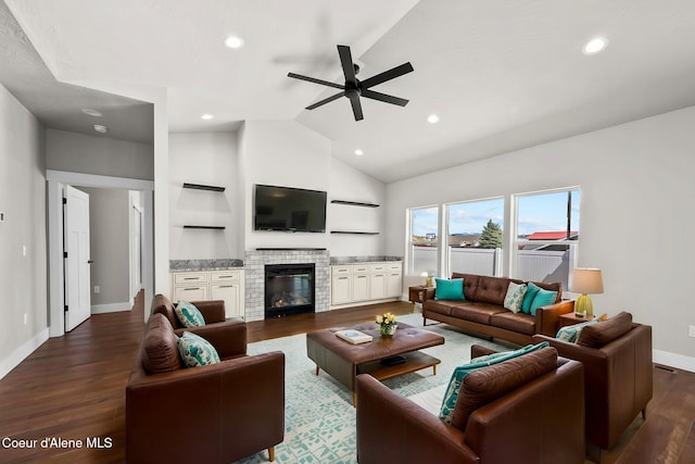 1225 W Orchard Ave, Hayden, ID 83835 - living room with vaulted ceiling, ceiling fan, baseboards, and wood finished floors