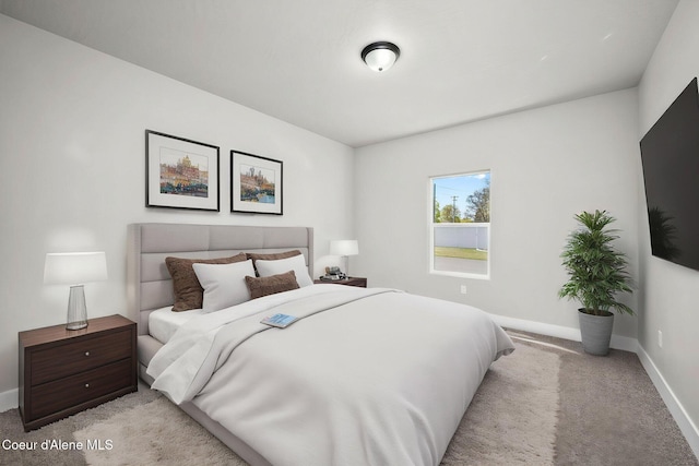 1225 W Orchard Ave, Hayden, ID 83835 - bedroom featuring baseboards and light colored carpet