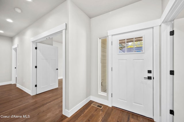 1225 W Orchard Ave, Hayden, ID 83835 - entrance foyer with visible vents, baseboards, dark wood-style floors, and recessed lighting