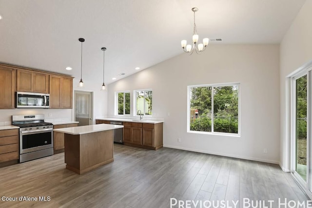 kitchen featuring a healthy amount of sunlight, visible vents, appliances with stainless steel finishes, and light countertops