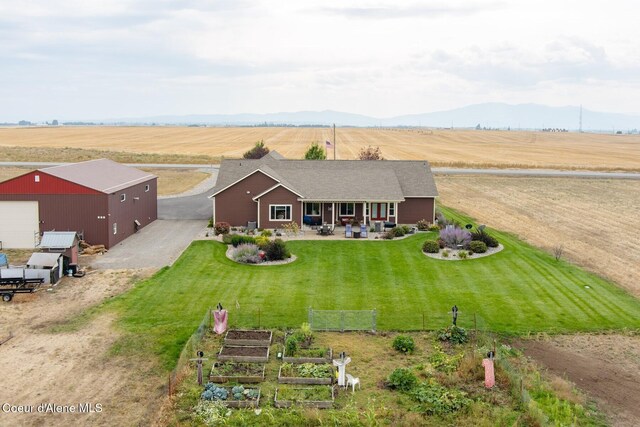 birds eye view of property featuring a rural view