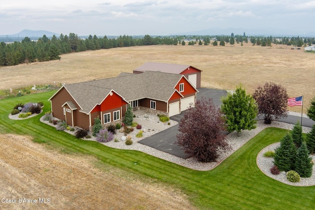 birds eye view of property featuring a rural view