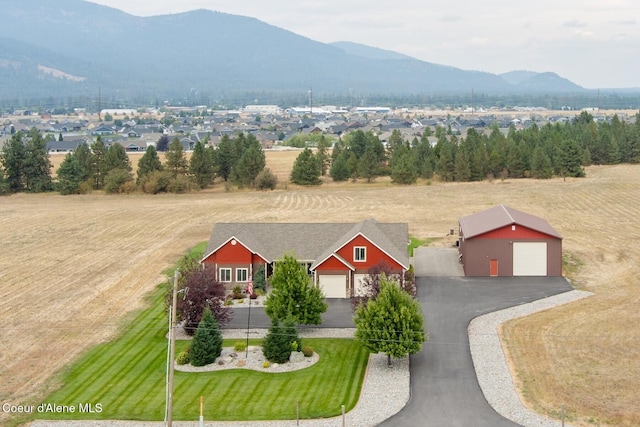 birds eye view of property featuring a mountain view