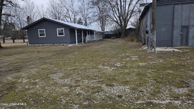 view of property exterior with a chimney