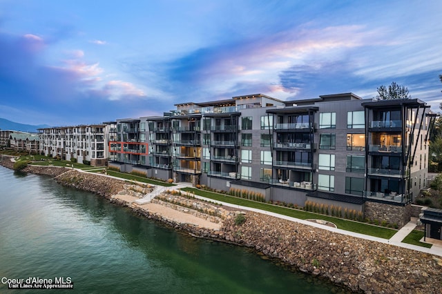 outdoor building at dusk with a water view