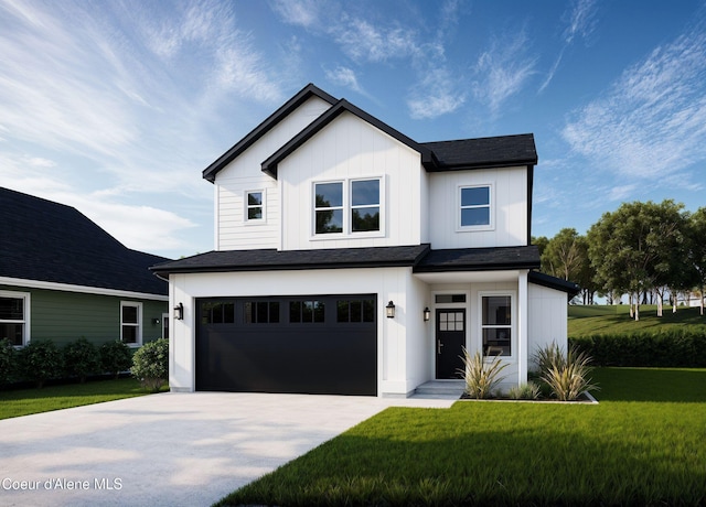 view of front facade featuring a garage and a front yard