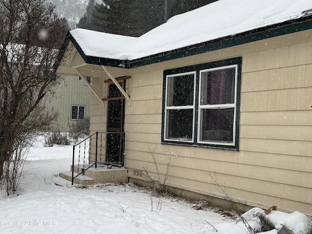 view of snow covered property