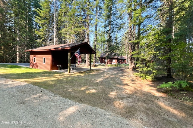 view of property exterior featuring a yard