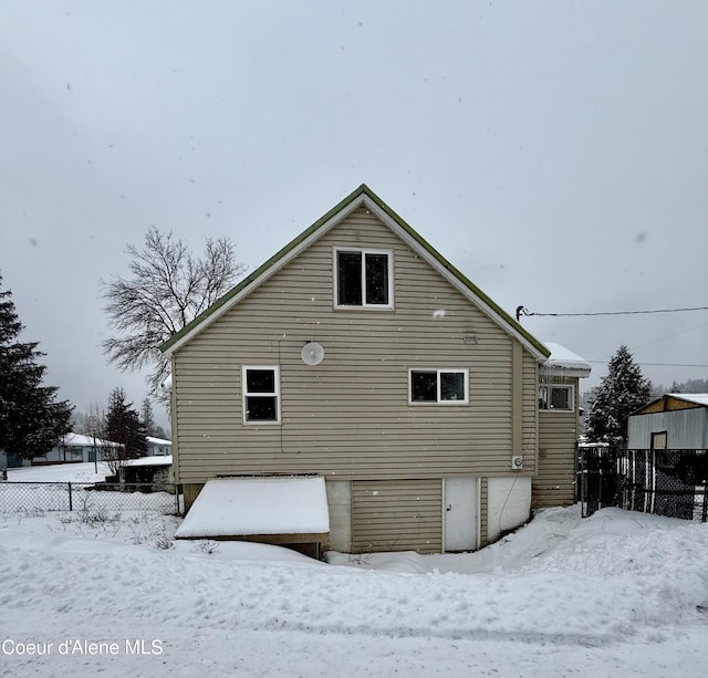 view of snow covered property