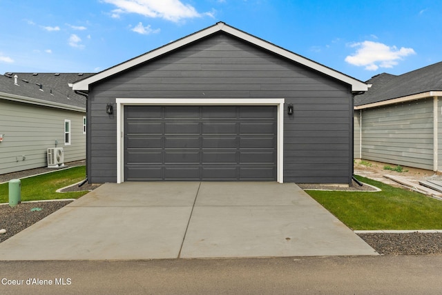 7148 N Bellac Ln, Coeur Dalene, ID 83815 - detached garage featuring ac unit