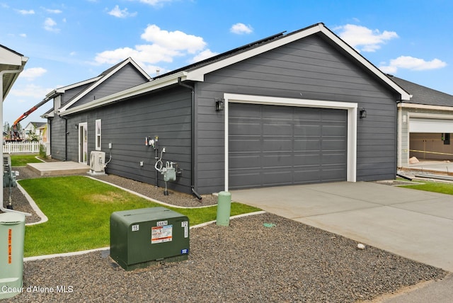 7148 N Bellac Ln, Coeur Dalene, ID 83815 - view of home's exterior featuring driveway and a garage
