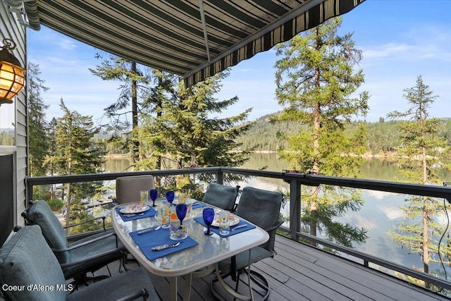 balcony with a deck with water view