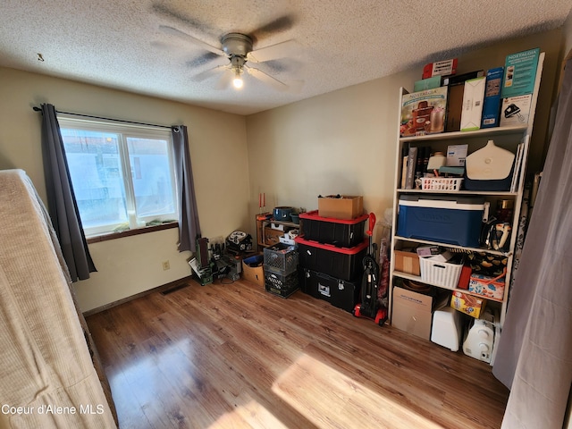 interior space featuring ceiling fan