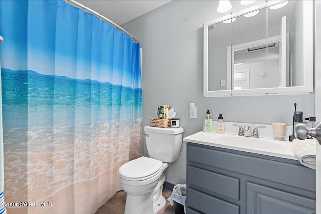 full bath featuring a shower with curtain, vanity, and toilet