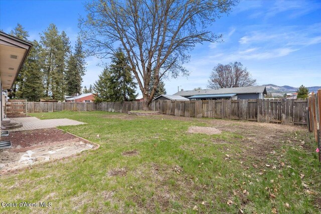 view of yard featuring a fenced backyard