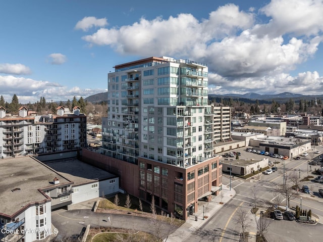 view of building exterior with a mountain view