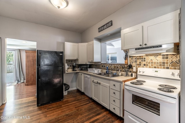 kitchen with white cabinetry, white appliances, and decorative backsplash