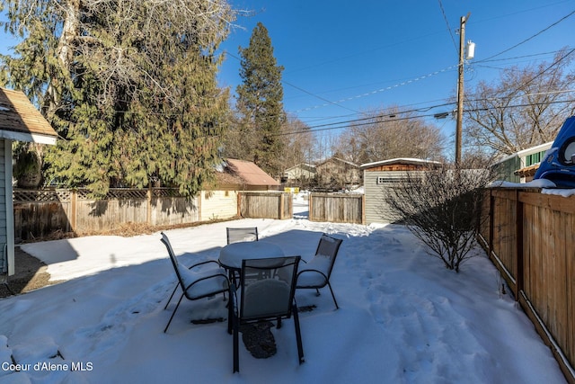 view of snow covered patio