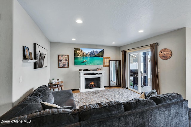 living room with a textured ceiling