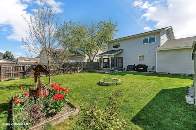 view of yard with a sunroom