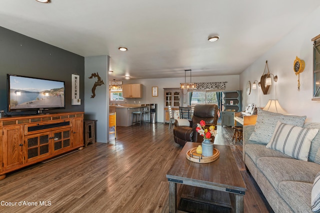 living room with dark hardwood / wood-style floors