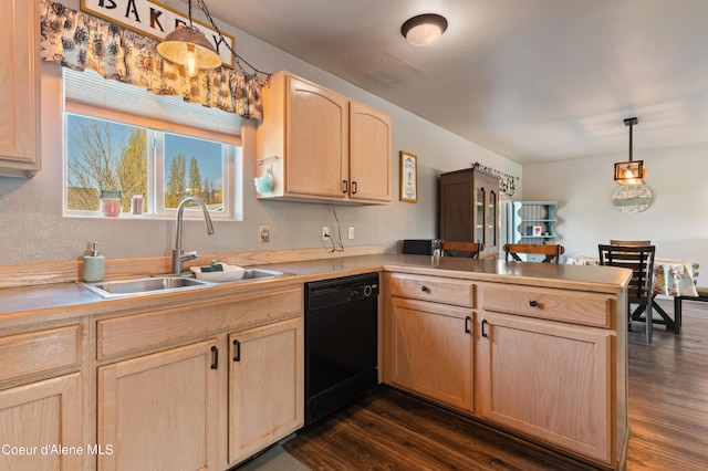 kitchen with decorative light fixtures, sink, black dishwasher, kitchen peninsula, and light brown cabinets