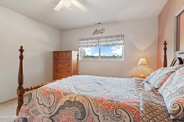 bedroom with ceiling fan and carpet flooring