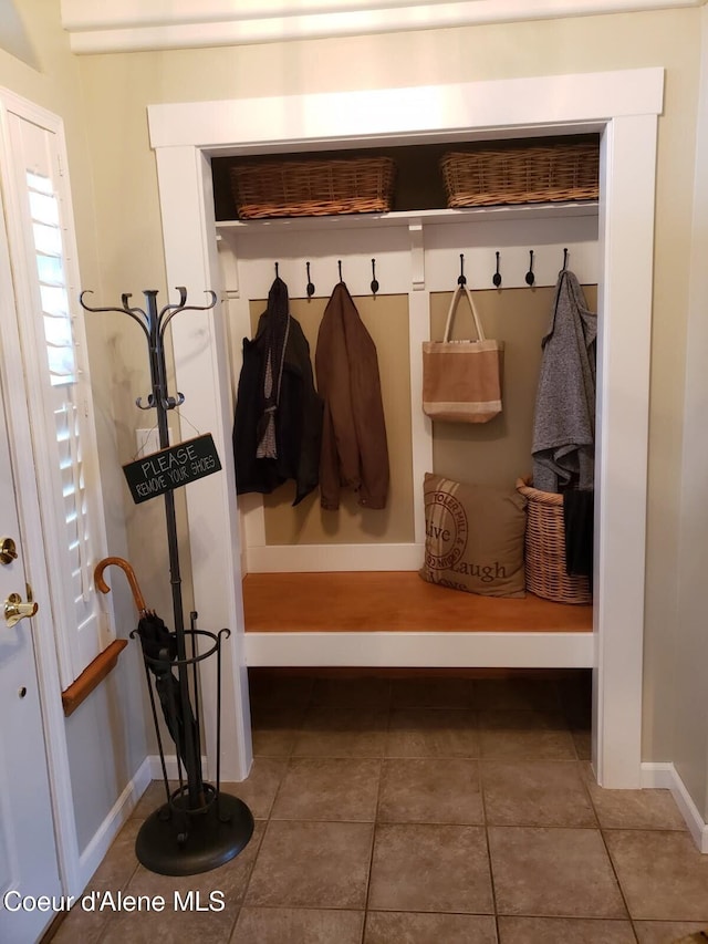 mudroom with tile patterned floors