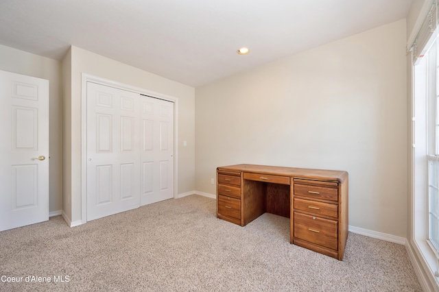 unfurnished office with light colored carpet