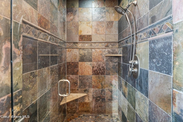 room details featuring an enclosed shower