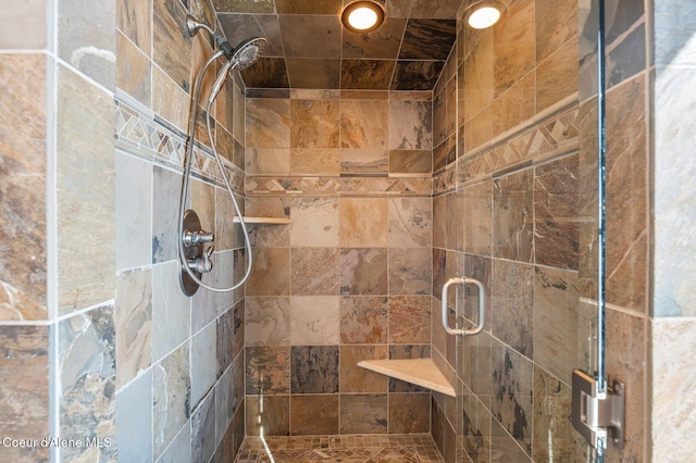 details featuring a shower with door