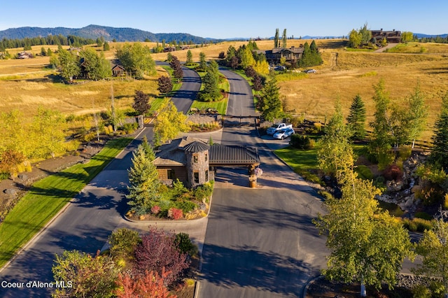 birds eye view of property featuring a mountain view