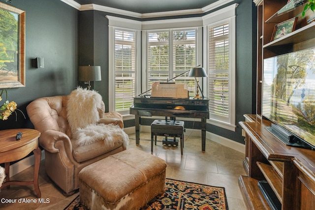 sitting room with light tile patterned flooring and ornamental molding