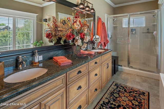 bathroom featuring vanity, an enclosed shower, and crown molding