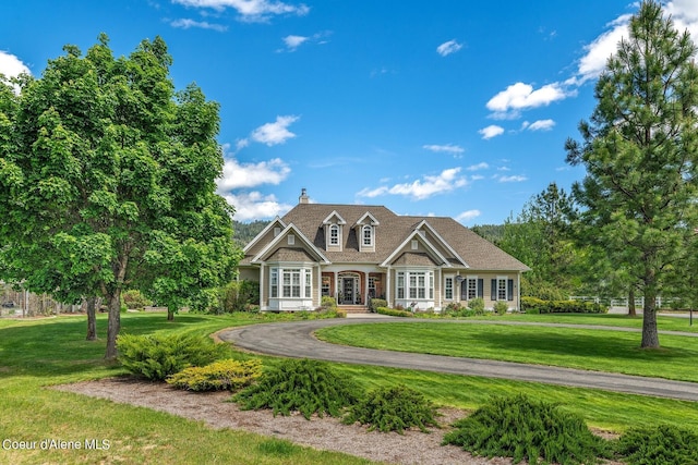 view of front of home with a front yard