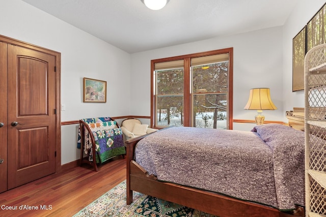 bedroom featuring hardwood / wood-style floors