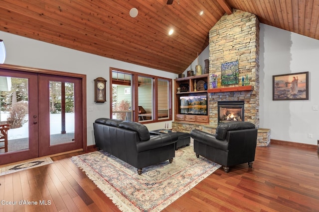 living room featuring french doors, wooden ceiling, and wood finished floors