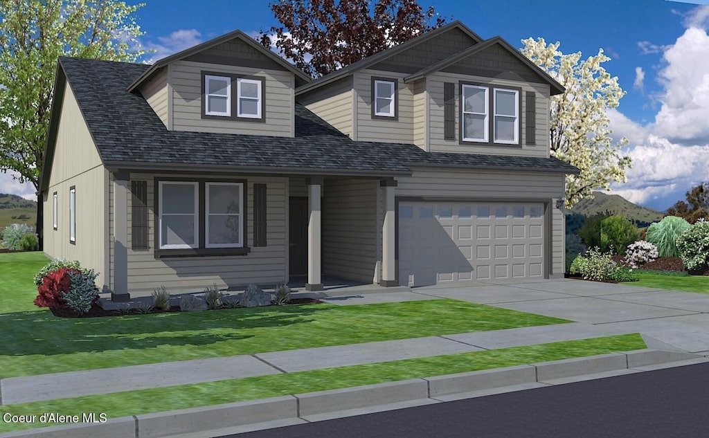 craftsman inspired home featuring a garage and a front yard