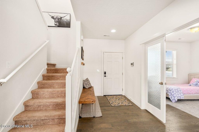 entryway featuring dark hardwood / wood-style floors