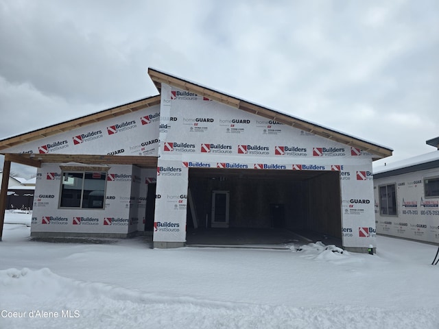 view of snow covered property