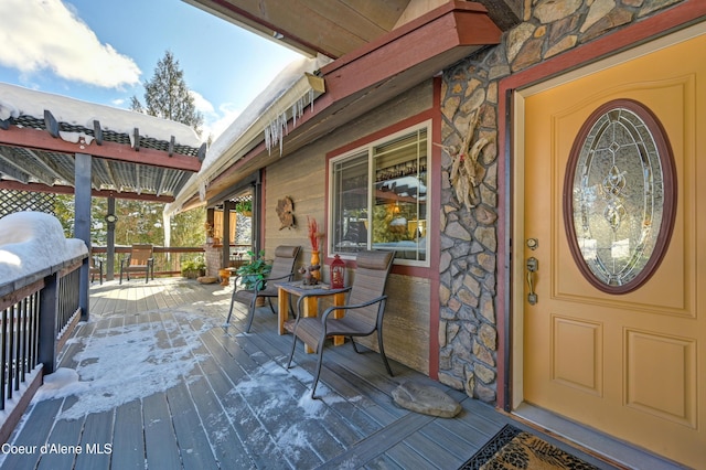 doorway to property with a porch