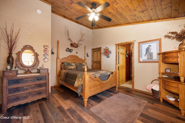 bedroom with lofted ceiling, wooden ceiling, ornamental molding, dark hardwood / wood-style flooring, and ceiling fan