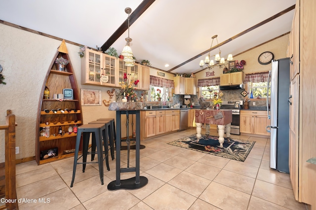 kitchen with vaulted ceiling, pendant lighting, light tile patterned floors, stainless steel appliances, and light brown cabinets